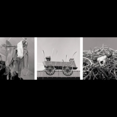Three black-and-white photographs: overlapping boot prints pressed into desert sand, a wooden utility pole rigged with crossarms and wires, and a bullet-riddled car door and quarter-panel abandoned in open desert.