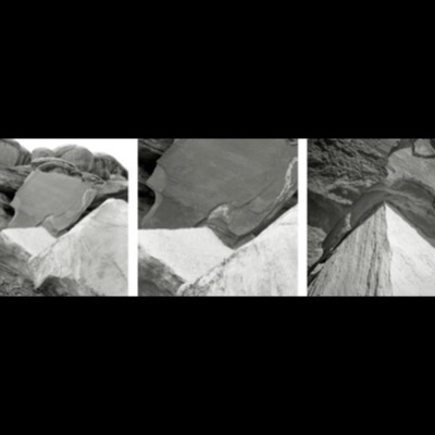 Three black-and-white photographs of eroded sandstone rock formations, tightly cropped studies of curved, layered rock surfaces and crevices meeting in sharp angles.