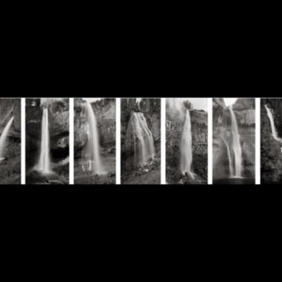 A grid of seven black-and-white waterfall photographs by Peter de Lory, each showing a different falls from the series in varying framings and settings.